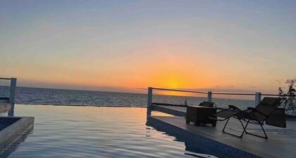 7BR Oceanfront Villa w/ Jacuzzi and House Staff