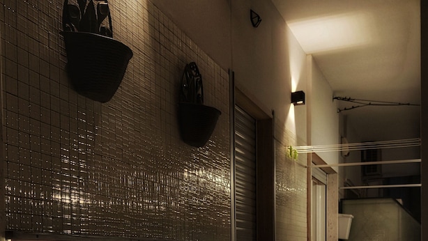 A modern kitchen with a stone backsplash, recessed lighting, and a view of the dining area. - Moma - Design Smart Rooms - Bari Central Station (Bari)