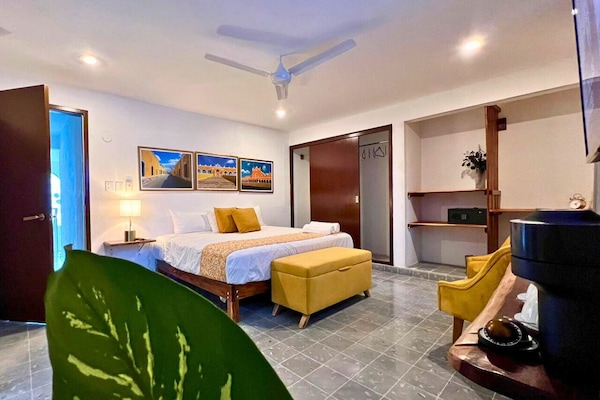 Habitación Deluxe | Ropa de cama de alta calidad, minibar, caja fuerte