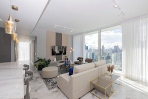Apartament de luxe, vistes a la ciutat | Sala d'estar