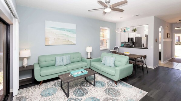 Townhome, Multiple Beds, Pool Access, Garden View (Just Beachy at Regal Palms) | Living area