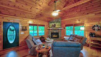 Cabin, Multiple Beds, Hot Tub, Mountain View (Heritage Hideaway 1) | Living area | Fireplace