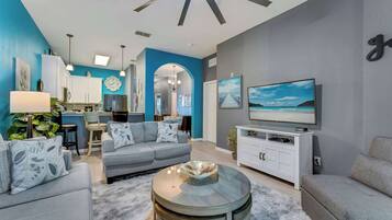 Condo, Multiple Beds, Balcony, Garden View (Oasis Hideaway at Bahama Bay) | Living area | 42-inch flat-screen TV with digital channels