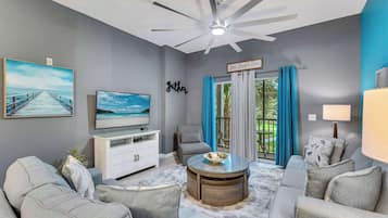 Condo, Multiple Beds, Balcony, Garden View (Oasis Hideaway at Bahama Bay) | Living area | 42-inch flat-screen TV with digital channels