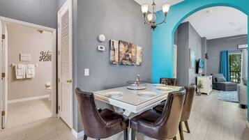 Condo, Multiple Beds, Balcony, Garden View (Oasis Hideaway at Bahama Bay) | Dining