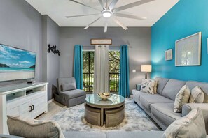 Condo, Multiple Beds, Balcony, Garden View (Oasis Hideaway at Bahama Bay) | Living area | 42-inch flat-screen TV with digital channels - Oasis Hideaway @bahama Bay (Davenport)