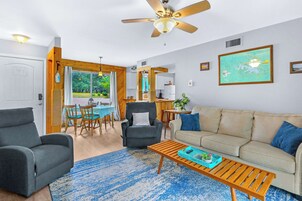 Condo, Multiple Beds, Patio, Garden View (Vicki’s Villa) | Living area | 42-inch flat-screen TV with digital channels, fireplace