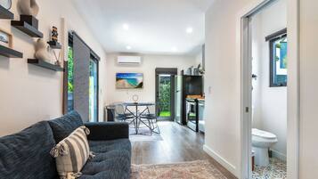 House, 1 Queen Bed with Sofa bed, Patio, Garden View (Palm Paradise Retreat) | Living area | 42-inch flat-screen TV with digital channels