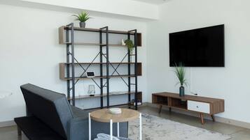 Studio Suite, 1 King Bed | Living area | 42-inch flat-screen TV with digital channels