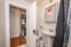 Apartment, 1 Queen Bed with Sofa bed, Kitchen, Garden View | Bathroom | Designer toiletries, towels, toilet paper