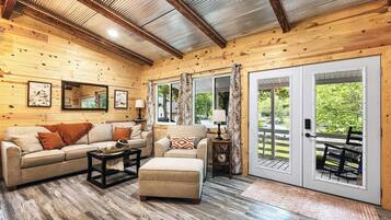 Cabin, Multiple Beds, Kitchen (Cozy Cove Cabin) | Living area | 42-inch flat-screen TV with digital channels