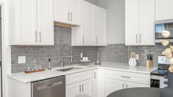 Apartment, Multiple Beds, Kitchen | Private kitchen | Coffee/tea maker