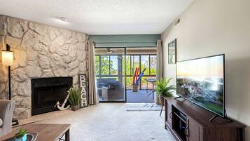 Condo, Multiple Beds, Pool Access, Garden View | Living area | Fireplace