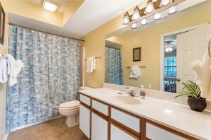 Condo, Multiple Beds, Balcony, Garden View (Evergreen Haven) | Bathroom | Combined shower/tub, hair dryer, towels