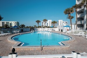 A heated pool - Updated direct oceanfront 2/2 with a private balcony, heated pool, and beach access (New Smyrna Beach)