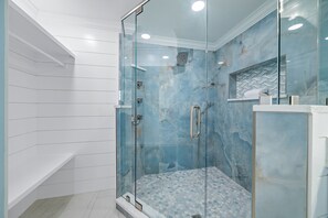 Shower, hair dryer, towels