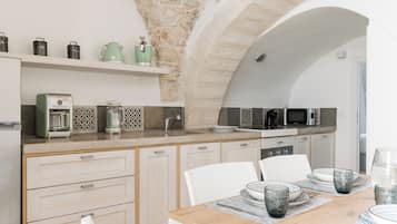 Apartment, Sea View | Private kitchenette | Highchair, cookware/dishes/utensils