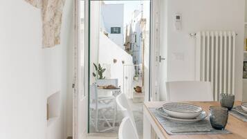 Apartment, Sea View | Private kitchen | High chair, cookware/dishes/utensils