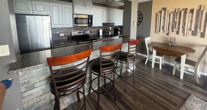 2B-2B centrally located in Omaha with skyline balcony views.