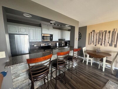 2B-2B centrally located in Omaha with skyline balcony views. 