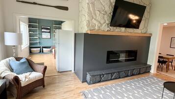 Smart TV, fireplace, books