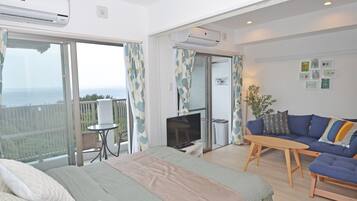 One-Bedroom Apartment, 2nd - 4th Floor, Non Smoking | Individually decorated, individually furnished, desk, blackout drapes