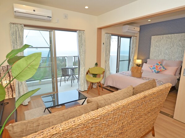 Two-Bedroom Apartment, 2nd - 4th Floor, Non Smoking | Living area | Flat-screen TV - churaumi terrace (Motobu)
