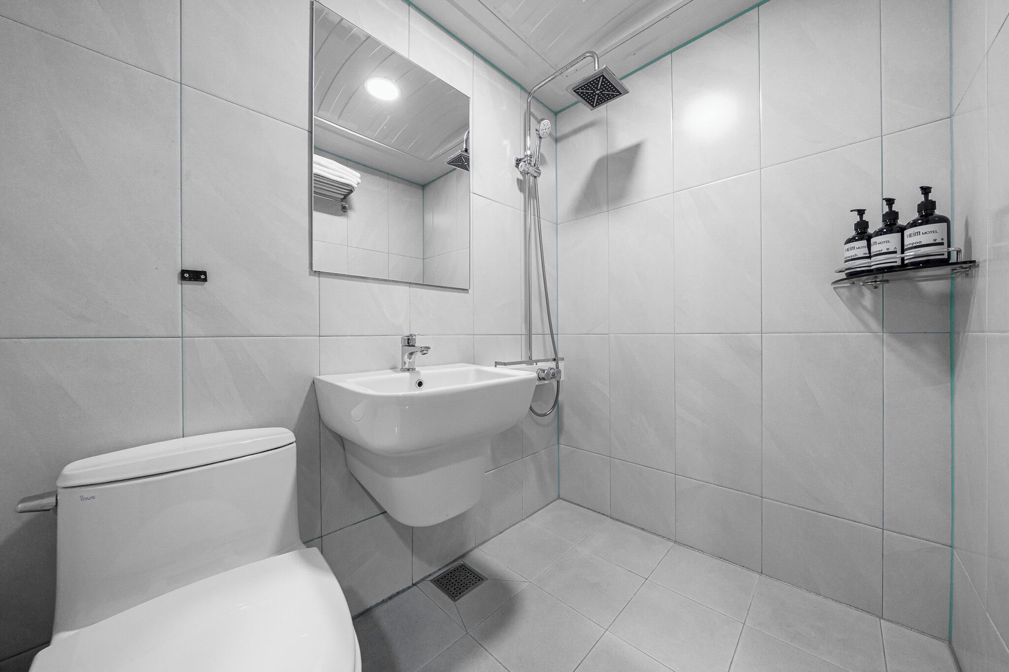 Double Room | Bathroom | Shower, hair dryer, bathrobes, towels