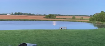 Barndominium in the country. Two acre fishing lake, large porch and Pickleball.