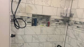 Shower, towels, soap, shampoo