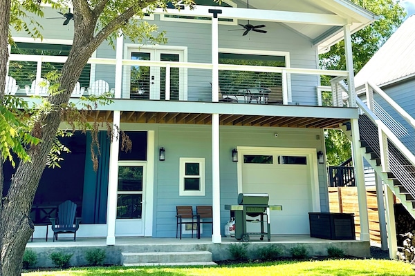 Two levels of covered decks, screened patio, and grill just steps from the dock