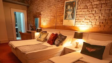Junior Triple Room, Multiple Beds, Non Smoking | Premium bedding, minibar, in-room safe, individually decorated