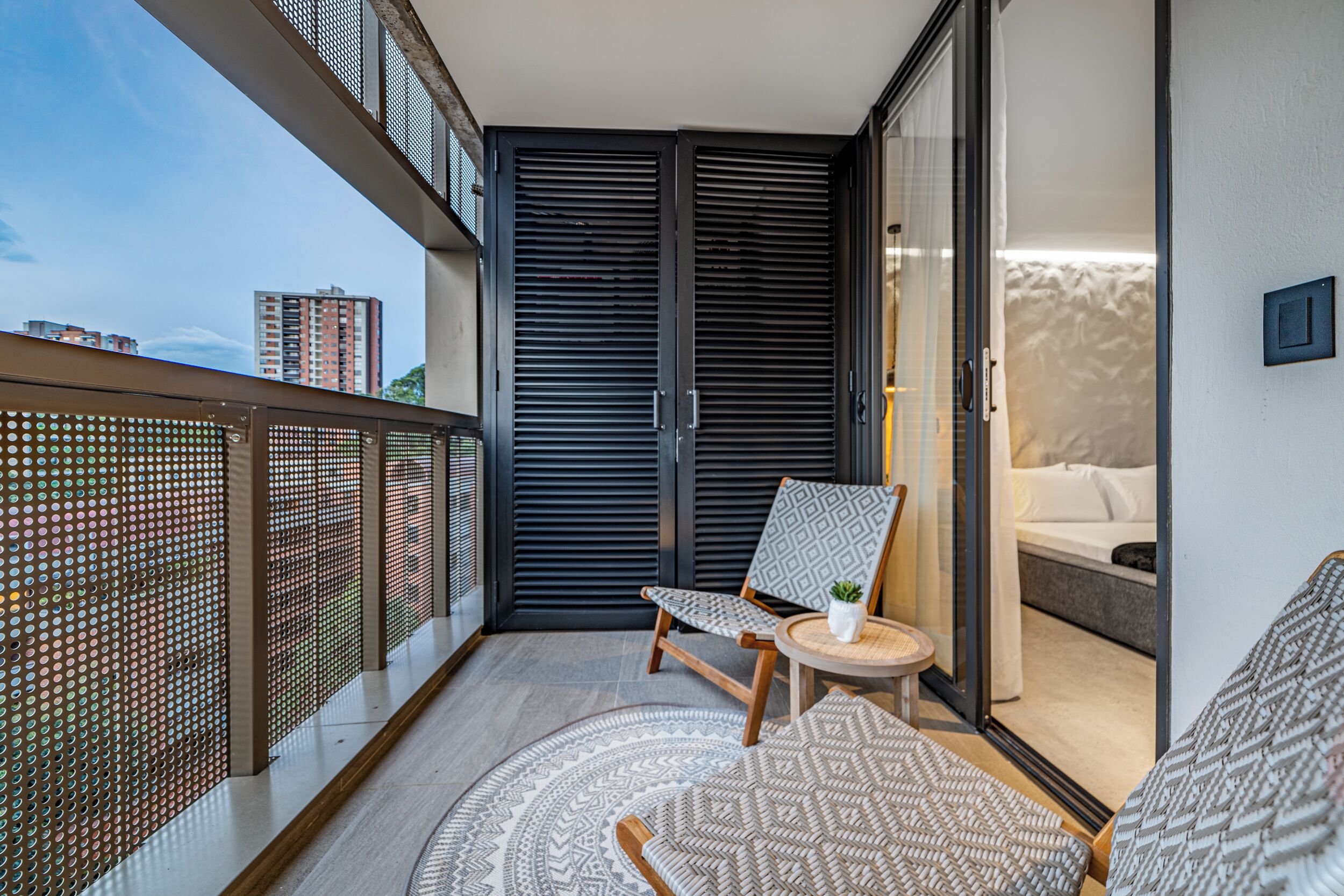 Departamento Deluxe, balcón, vista a la ciudad | Balcón