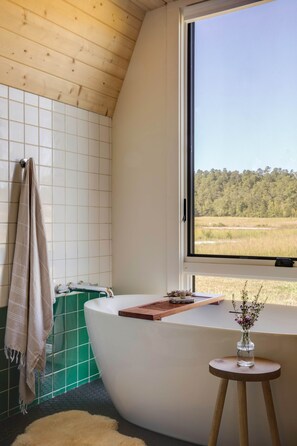 Shower, eco-friendly toiletries, hair dryer, towels