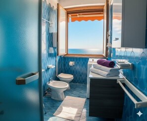 Bruser, hårtørrer, bidet, håndklæder