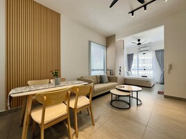 Basic Studio | Living area | 50-cm LCD TV with cable channels, Netflix, streaming services