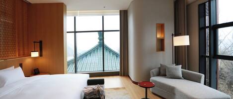 ラグジュアリー スタジオスイート | 羽毛の掛け布団、ミニバー (無料)、セーフティボックス (室内)、客室ごとに異なる装飾