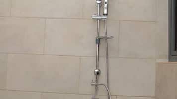 Deluxe Apartment, Hill View | Bathroom | Shower, free toiletries, slippers, towels