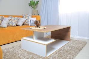Deluxe Apartment, Non Smoking, Hill View | Living area | Flat-screen TV - Cozy Condo At Najjera Heights (Kampala)