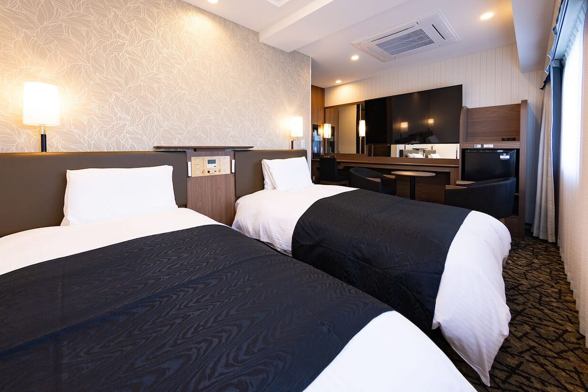 Edredons de pluma, escrivaninha, cortinas blackout, Wi-Fi de cortesia