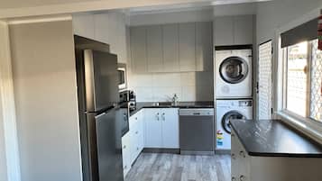 Premium Apartment, 2 Bedrooms | Private kitchen | Full-sized fridge, microwave, oven, stovetop