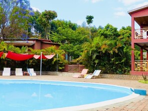 Outdoor pool, free pool cabanas, pool umbrellas
