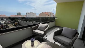 Departamento Confort, balcĂłn, vista al mar | Terraza o patio