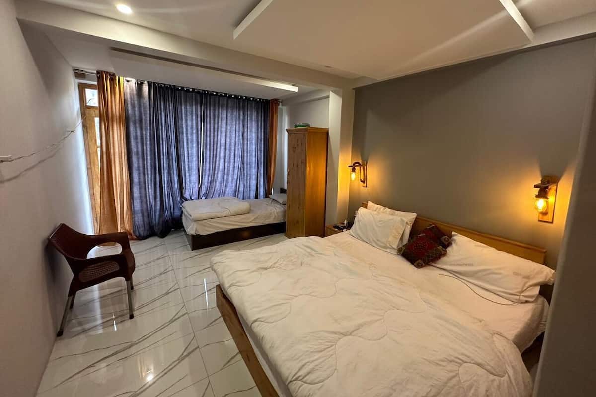 Luxe driepersoonskamer | Gratis wifi, beddengoed