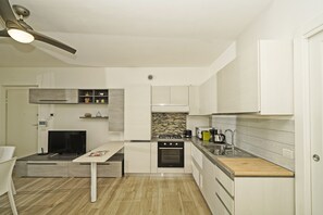 Apartment, Pool View | Private kitchen | Electric kettle, toaster