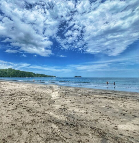 Spacious 3 Bedroom Condo - Walk to the Beach