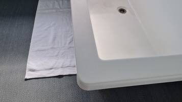 Hair dryer, bidet, towels, soap