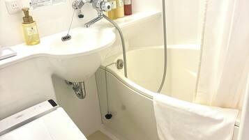 Basic Twin Room, City View | Bathroom | Bathtub, free toiletries, hair dryer, slippers