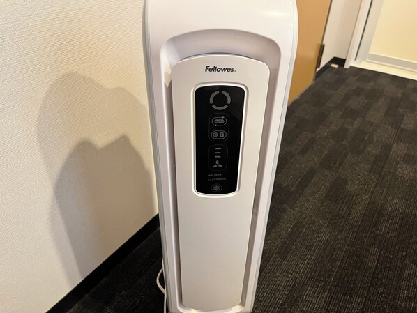 A white water dispenser with a control panel labeled "Fellowes." - Hotel Japanesque Kyoto Station ZEQUU ANNEX (Kyoto)