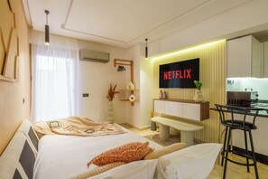 1 slaapkamer, een strijkplank/strijkijzer, wifi, beddengoed